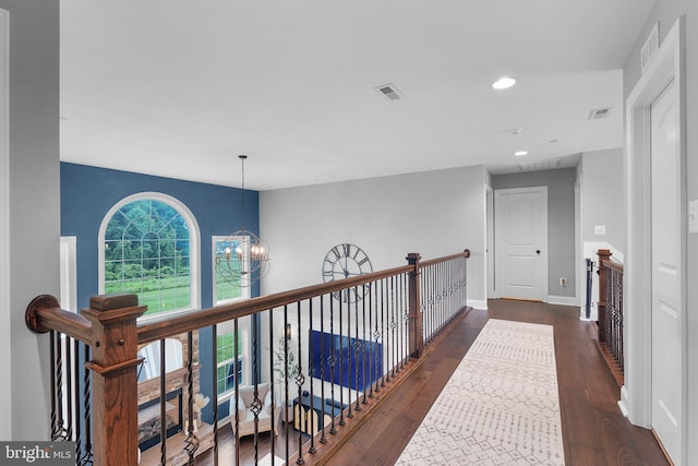 815 Summersweet Ct, Huntingtown, MD 20639 - hall with a chandelier, dark wood-type flooring, recessed lighting, an upstairs landing, and baseboards