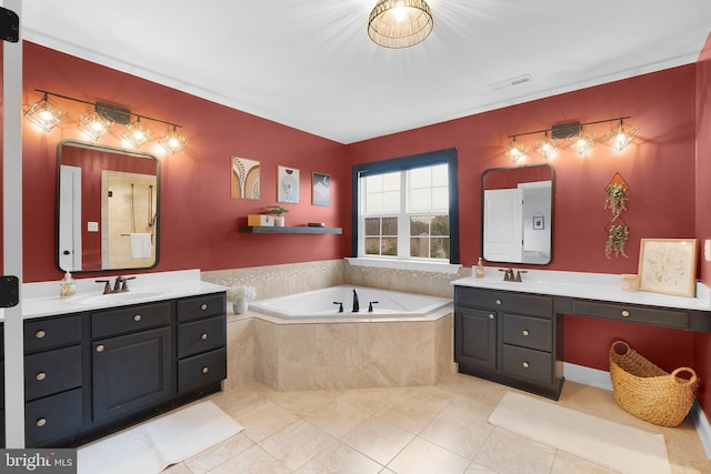815 Summersweet Ct, Huntingtown, MD 20639 - bathroom featuring a bath, two vanities, and tile patterned floors