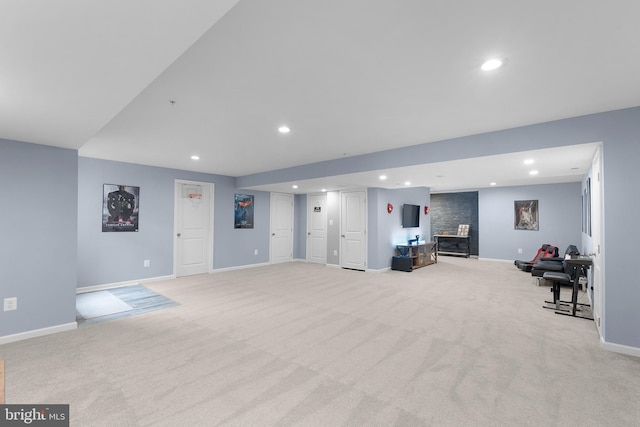 815 Summersweet Ct, Huntingtown, MD 20639 - living area with light carpet, recessed lighting, and baseboards