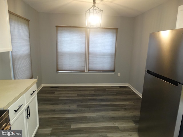 112 Colton Ct, Smithsburg, MD 21783 - unfurnished dining area featuring dark wood-style floors and baseboards