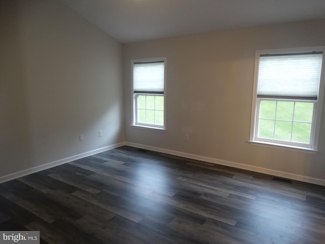 112 Colton Ct, Smithsburg, MD 21783 - empty room with dark wood-type flooring, baseboards, and vaulted ceiling