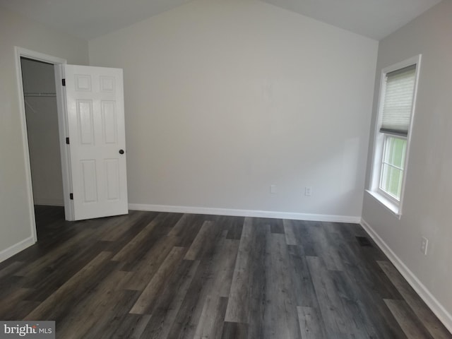 112 Colton Ct, Smithsburg, MD 21783 - empty room with dark wood-style floors, lofted ceiling, and baseboards