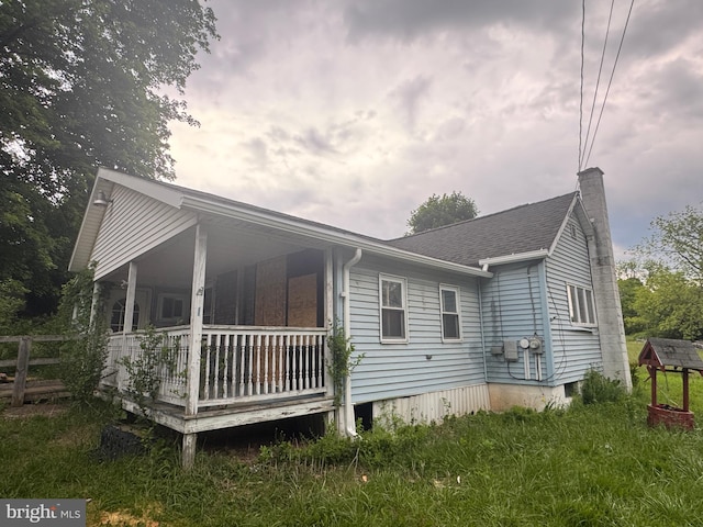 4161 Jacksonville Rd, Howard, PA 16841 - view of home's exterior with a chimney and a shingled roof