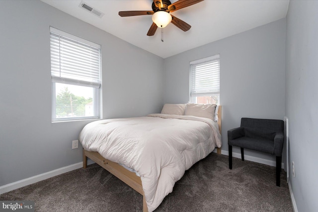 1005 Madison Ct, Annapolis, MD 21403 - bedroom featuring dark colored carpet, multiple windows, baseboards, and ceiling fan