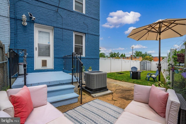 1005 Madison Ct, Annapolis, MD 21403 - deck with central air condition unit, an outdoor hangout area, and a fenced backyard