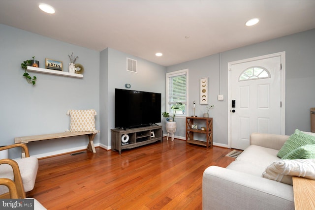 1005 Madison Ct, Annapolis, MD 21403 - living room with wood finished floors, recessed lighting, and baseboards