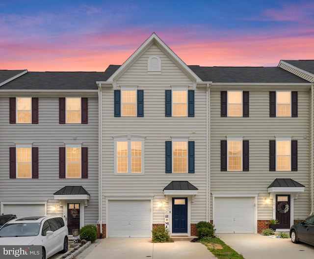 107 Lookout Way, Fredericksburg, VA 22405 - view of property with concrete driveway, a garage, and brick siding