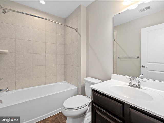 107 Lookout Way, Fredericksburg, VA 22405 - bathroom featuring toilet, vanity, wood finished floors, and tub / shower combination