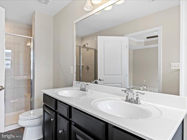 107 Lookout Way, Fredericksburg, VA 22405 - full bathroom with double vanity, a shower stall, and toilet