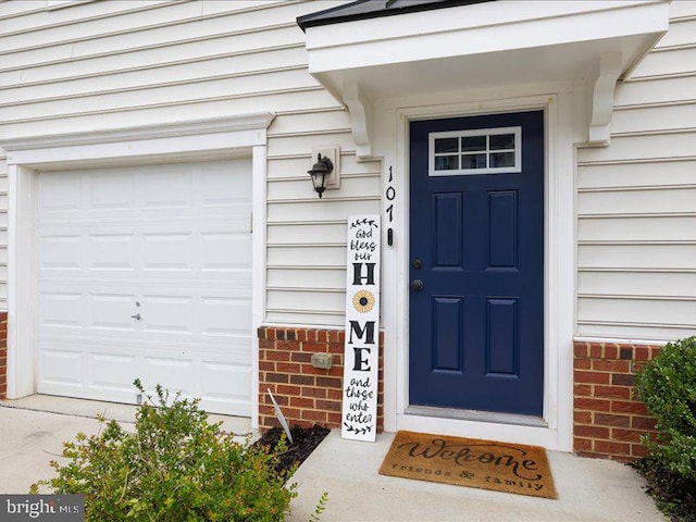 107 Lookout Way, Fredericksburg, VA 22405 - property entrance with a garage and brick siding