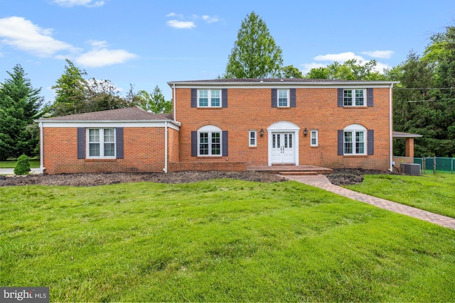 1 Carriage Way, Cinnaminson, NJ 08077 - colonial house with a front yard, brick siding, central AC unit, and french doors