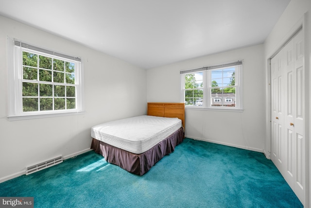 1 Carriage Way, Cinnaminson, NJ 08077 - carpeted bedroom with a closet and baseboards