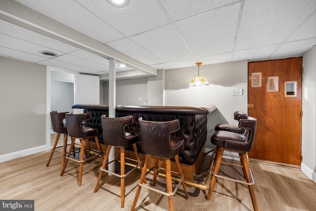 1 Carriage Way, Cinnaminson, NJ 08077 - indoor dry bar featuring a paneled ceiling, wood finished floors, and baseboards