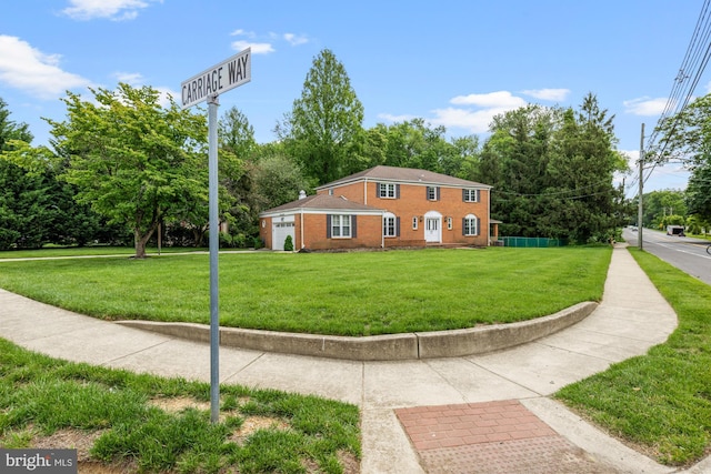 1 Carriage Way, Cinnaminson, NJ 08077 - view of front of property featuring a front yard, a garage, and brick siding
