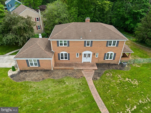 1 Carriage Way, Cinnaminson, NJ 08077 - rear view of property with a chimney, a lawn, central air condition unit, brick siding, and a shingled roof