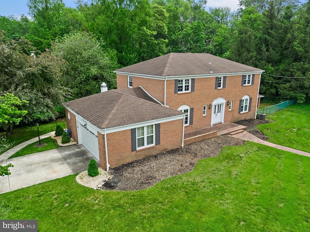 1 Carriage Way, Cinnaminson, NJ 08077 - view of front facade featuring driveway, a garage, brick siding, a shingled roof, and a chimney