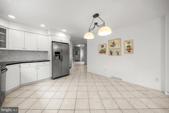 1 Carriage Way, Cinnaminson, NJ 08077 - kitchen with stainless steel refrigerator with ice dispenser, dark countertops, tasteful backsplash, white cabinetry, and recessed lighting