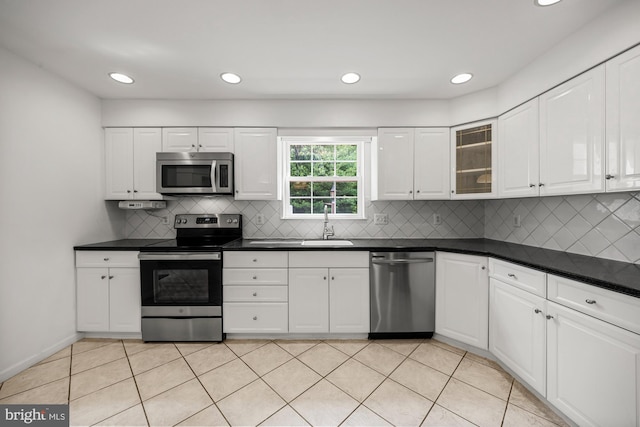 1 Carriage Way, Cinnaminson, NJ 08077 - kitchen with stainless steel appliances, a sink, dark countertops, white cabinets, and recessed lighting