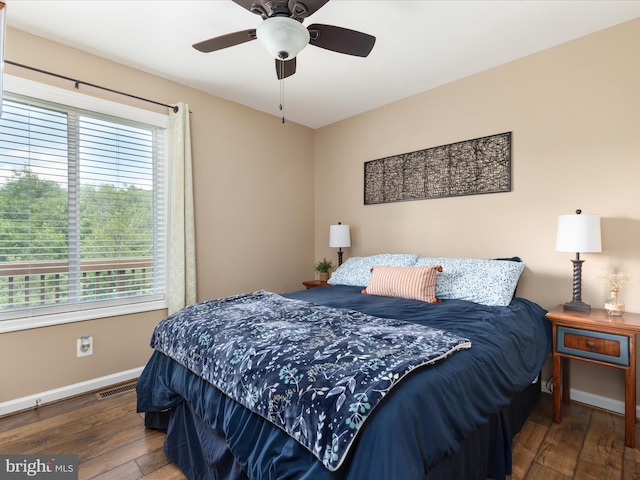 1439 Fiery Run Rd, Linden, VA 22642 - bedroom with wood-type flooring, baseboards, and a ceiling fan