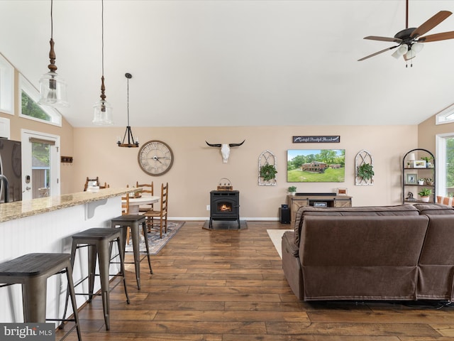 1439 Fiery Run Rd, Linden, VA 22642 - living area with a wood stove, dark wood-style flooring, plenty of natural light, and high vaulted ceiling