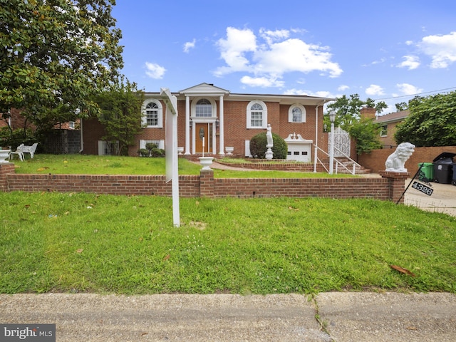4326 Ranger Ave, Temple Hills, MD 20748 - greek revival house featuring brick siding and a front yard