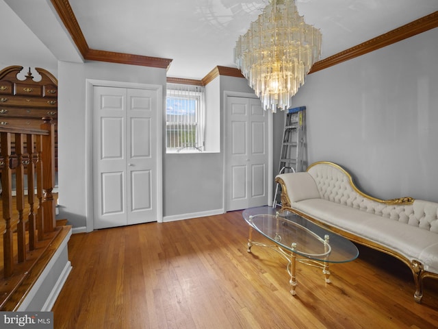 4326 Ranger Ave, Temple Hills, MD 20748 - sitting room with crown molding, baseboards, a chandelier, and wood finished floors