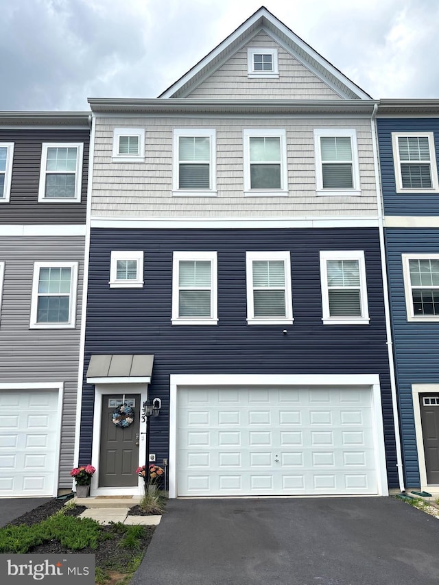 133 Lindy, Stephenson, VA 22656 - townhome / multi-family property with driveway and an attached garage