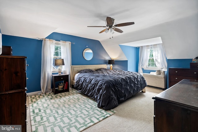 915 Edgewood Dr, Springfield, PA 19064 - carpeted bedroom with multiple windows, lofted ceiling, and a ceiling fan