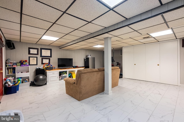 915 Edgewood Dr, Springfield, PA 19064 - living area with marble look tile flooring and a drop ceiling