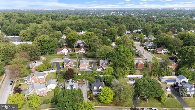 915 Edgewood Dr, Springfield, PA 19064 - aerial view of property and surrounding area featuring nearby suburban area and a heavily wooded area