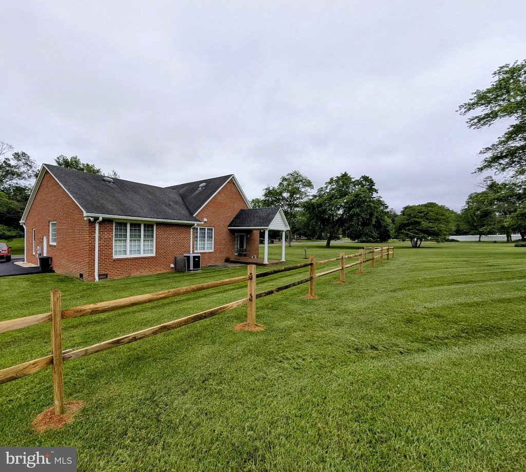 7054 Lakeview Dr, Warrenton, VA 20187 - view of side of property with brick siding and central AC