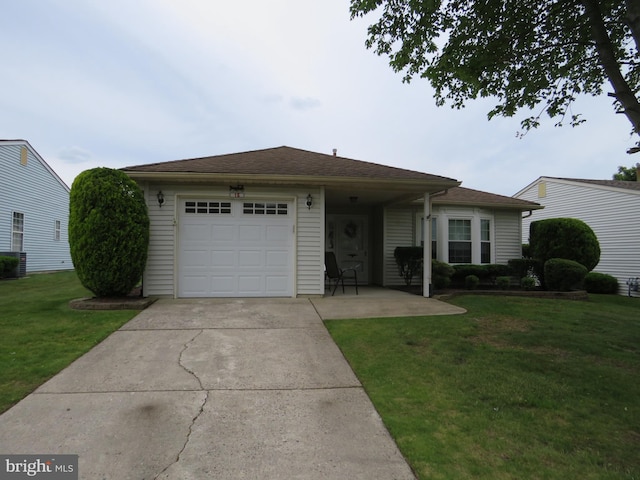 15 Meadowwood Ct, Columbus, NJ 08022 - view of front of property with a front yard, a garage, and concrete driveway