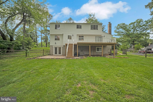 1127 Riva Ridge Dr, Great Falls, VA 22066 - rear view of property with french doors, a wooden deck, a chimney, and a patio area