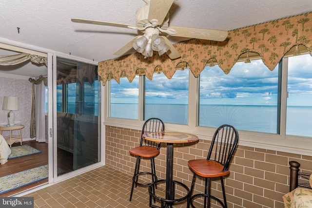 10300 Coastal Hwy Unit 1905, Ocean City, MD 21842 - sunroom / solarium with a textured ceiling and wallpapered walls