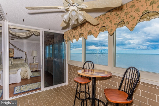 10300 Coastal Hwy Unit 1905, Ocean City, MD 21842 - sunroom featuring a textured ceiling