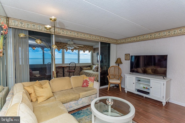10300 Coastal Hwy Unit 1905, Ocean City, MD 21842 - living area with a textured ceiling, wood finished floors, baseboards, and a ceiling fan