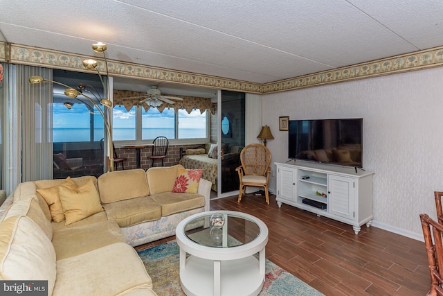 10300 Coastal Hwy Unit 1905, Ocean City, MD 21842 - living area featuring baseboards, wood finished floors, a textured ceiling, and a ceiling fan