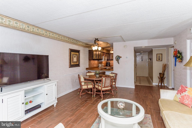 10300 Coastal Hwy Unit 1905, Ocean City, MD 21842 - living area featuring wood finished floors, baseboards, and a textured ceiling