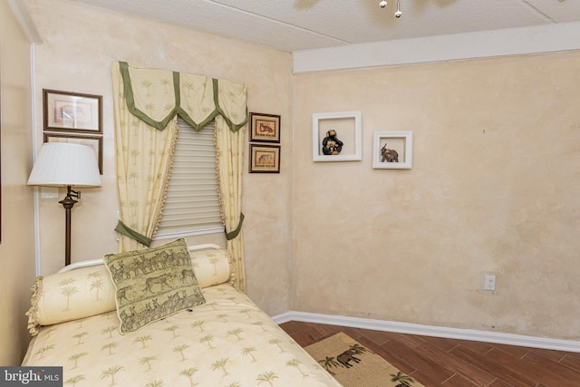10300 Coastal Hwy Unit 1905, Ocean City, MD 21842 - bedroom featuring dark wood-style flooring, baseboards, and ceiling fan