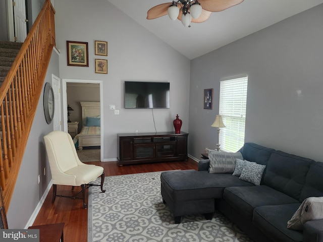 45 Freedom Ln, Bensalem, PA 19020 - living room featuring a ceiling fan, wood finished floors, stairs, baseboards, and high vaulted ceiling