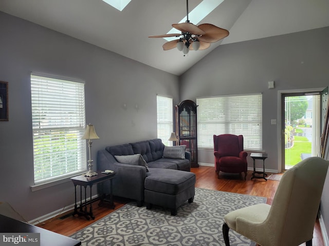 45 Freedom Ln, Bensalem, PA 19020 - living area featuring high vaulted ceiling, a ceiling fan, healthy amount of natural light, wood finished floors, and baseboards