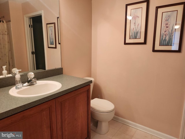 45 Freedom Ln, Bensalem, PA 19020 - bathroom featuring toilet, vanity, tile patterned flooring, and baseboards
