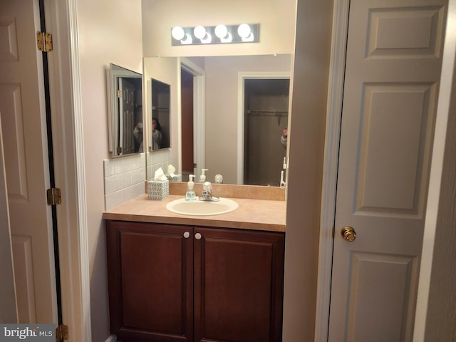 45 Freedom Ln, Bensalem, PA 19020 - bathroom with vanity, a closet, and tasteful backsplash