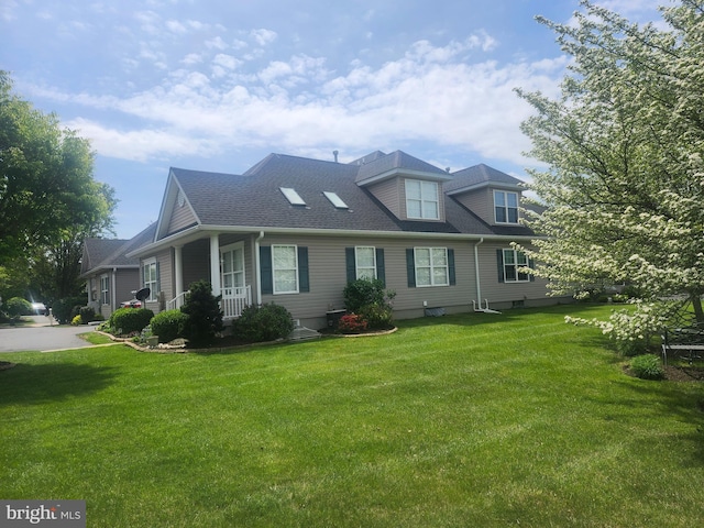 45 Freedom Ln, Bensalem, PA 19020 - view of front of home with a front yard, covered porch, and a shingled roof