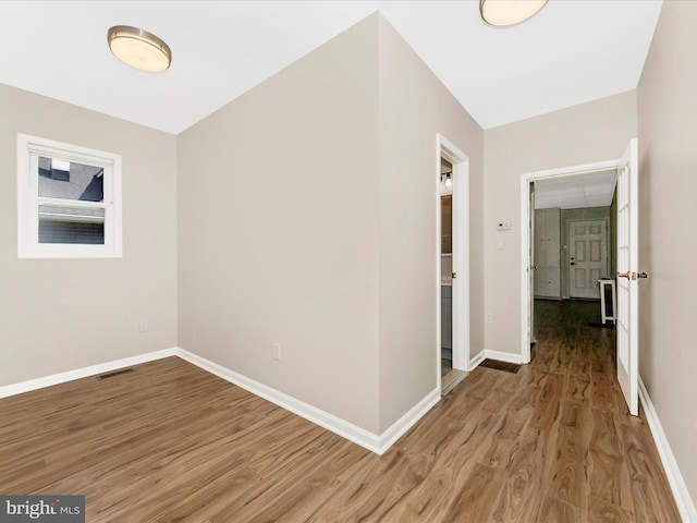 1707 Hall Ave, Baltimore, MD 21227 - corridor featuring wood finished floors and baseboards