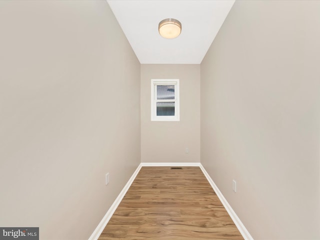 1707 Hall Ave, Baltimore, MD 21227 - spare room featuring light wood-type flooring and baseboards