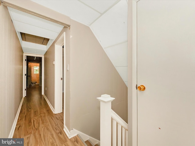 1707 Hall Ave, Baltimore, MD 21227 - corridor with an upstairs landing, attic access, and wood finished floors