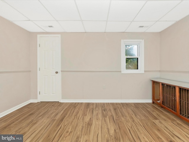 1707 Hall Ave, Baltimore, MD 21227 - unfurnished room with a paneled ceiling and wood finished floors
