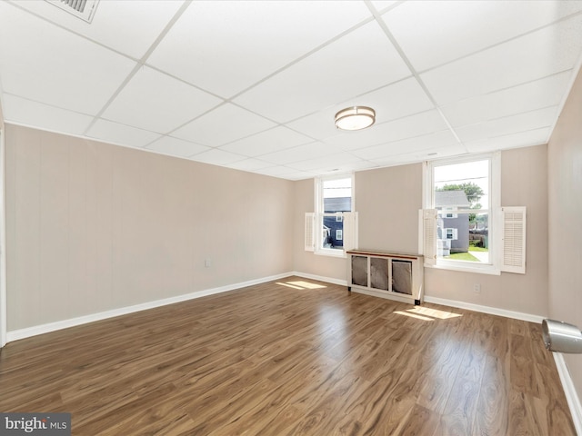 1707 Hall Ave, Baltimore, MD 21227 - unfurnished room featuring wood finished floors and a drop ceiling