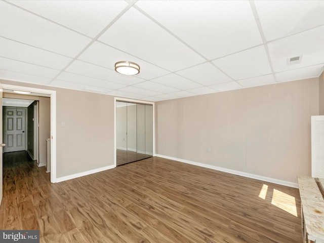1707 Hall Ave, Baltimore, MD 21227 - interior space featuring a drop ceiling and wood finished floors